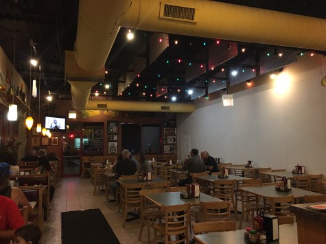 The inside of Falco's Pizza provides plentiful seating 