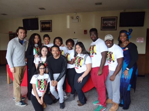 Members of the BHM club pose with Anthony Paul, who competed on The Voice. 